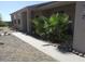 Side view of house exterior, walkway to entryway at 725 W Hermosa Dr, Wickenburg, AZ 85390