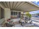 Covered patio with golf cart and seating area at 7750 E Broadway Rd # 309, Mesa, AZ 85208
