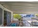 Covered patio with outdoor furniture and a view of the community at 7750 E Broadway Rd # 309, Mesa, AZ 85208