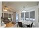 Bright dining area with bay window, table for four, and comfortable couch at 7750 E Broadway Rd # 309, Mesa, AZ 85208
