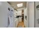 Clean and functional kitchen with white cabinets and appliances at 7750 E Broadway Rd # 309, Mesa, AZ 85208