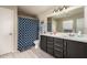 Bathroom with double vanity and walk-in shower at 8454 E Keats Ave, Mesa, AZ 85209