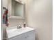 Small bathroom with vanity, sink and mirror at 8454 E Keats Ave, Mesa, AZ 85209