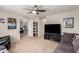 Large bonus room with TV, couch and access to bedroom at 8454 E Keats Ave, Mesa, AZ 85209