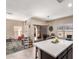 Kitchen with island and view into adjacent dining area at 8454 E Keats Ave, Mesa, AZ 85209