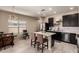 Modern kitchen with dark cabinets and white countertops at 8454 E Keats Ave, Mesa, AZ 85209