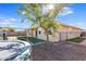 Home's backyard with trampoline and play area at 9038 W Orchid Ln, Peoria, AZ 85345