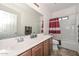 Bathroom with single vanity, bathtub, and shower at 9911 W Jessie Ln, Peoria, AZ 85383
