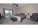 Spacious bedroom with sliding door access to backyard at 9911 W Jessie Ln, Peoria, AZ 85383