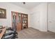 Home office features a large desk and built-in shelving at 9911 W Jessie Ln, Peoria, AZ 85383