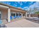 Relaxing covered patio with lounge chairs and outdoor seating at 9911 W Jessie Ln, Peoria, AZ 85383