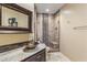 Bathroom with walk-in shower, vessel sink, and granite vanity at 10222 E Southwind Ln # 1066, Scottsdale, AZ 85262