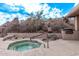 Community hot tub with surrounding desert landscape at 10222 E Southwind Ln # 1066, Scottsdale, AZ 85262