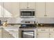 Stainless steel appliances and granite countertops in this modern kitchen at 10222 E Southwind Ln # 1066, Scottsdale, AZ 85262