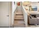 Modern staircase with light wood and metal accents at 10222 E Southwind Ln # 1066, Scottsdale, AZ 85262