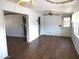 Light and airy dining room with laminate floors and built-in shelving at 11001 W Connecticut Ave, Sun City, AZ 85351