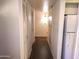 Light and bright hallway with laminate flooring and ample closet space at 11001 W Connecticut Ave, Sun City, AZ 85351