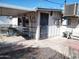 Covered patio area with table and chairs at 11001 W Connecticut Ave, Sun City, AZ 85351