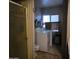 Bathroom with toilet, shower, and laundry at 11411 N 91St Ave # 80, Peoria, AZ 85345