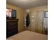 Bedroom with a dresser, double bed, and closet at 11411 N 91St Ave # 80, Peoria, AZ 85345