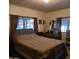 Main bedroom with a double bed and a vanity at 11411 N 91St Ave # 80, Peoria, AZ 85345