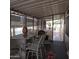 Covered patio with bar-height table and chairs at 11411 N 91St Ave # 80, Peoria, AZ 85345