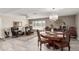 Cozy living room with decorative wood table, area rug and lots of natural light at 11427 S Tomah St, Phoenix, AZ 85044