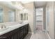 Bathroom features double vanity, walk-in shower, and plenty of storage at 12528 W Tuckey W Ln, Glendale, AZ 85307