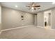 Spacious bedroom with ceiling fan and TV mount at 12528 W Tuckey W Ln, Glendale, AZ 85307