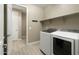 Convenient laundry room with washer and dryer hookups at 12528 W Tuckey W Ln, Glendale, AZ 85307