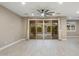 Living area with sliding glass doors and view of backyard at 12528 W Tuckey W Ln, Glendale, AZ 85307