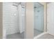 Large walk-in shower with subway tile and glass enclosure at 12528 W Tuckey W Ln, Glendale, AZ 85307