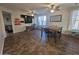 Dining area with a table and chairs, tile floors, and ceiling fan at 1378 E Madison Dr, Casa Grande, AZ 85122