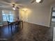 Dining area with a table and chairs, tile floors, and ceiling fan at 1378 E Madison Dr, Casa Grande, AZ 85122