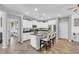 Kitchen with white cabinets, granite counters, and an island at 1378 E Madison Dr, Casa Grande, AZ 85122