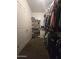 Large walk-in closet with built-in shelving and hanging space at 1378 E Madison Dr, Casa Grande, AZ 85122