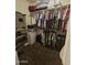 Large walk-in closet with shelving and hanging rods at 1378 E Madison Dr, Casa Grande, AZ 85122