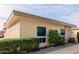 Light-beige condo building with walkway and landscaping at 14017 N 111Th Ave, Sun City, AZ 85351