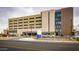 Modern hospital building with spacious parking area at 14017 N 111Th Ave, Sun City, AZ 85351