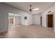 Living room with access to patio and light wood floors at 14017 N 111Th Ave, Sun City, AZ 85351