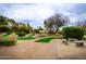 Enjoyable mini golf course with green turf and benches at 14017 N 111Th Ave, Sun City, AZ 85351