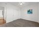 Bedroom with ceiling fan and double doors to closet at 15119 W Via Montoya --, Sun City West, AZ 85375