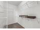 Walk-in closet with wire shelving providing ample storage at 15119 W Via Montoya --, Sun City West, AZ 85375