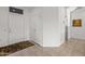 Bright entryway with tile flooring, coat closet, and neutral color palette at 15119 W Via Montoya --, Sun City West, AZ 85375