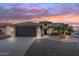 Two-car garage home with desert landscaping at 15119 W Via Montoya --, Sun City West, AZ 85375