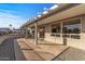 Covered patio with gravel and view of backyard at 15119 W Via Montoya --, Sun City West, AZ 85375