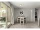 Bright dining area with sliding glass door leading to backyard at 1615 E Maddison Cir, San Tan Valley, AZ 85140