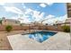 Relaxing backyard oasis with sparkling pool and patio at 1615 E Maddison Cir, San Tan Valley, AZ 85140