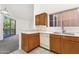 Kitchen area with laminate countertops and a window with a view to the outside at 1633 E Lakeside Dr # 127, Gilbert, AZ 85234