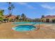 Resort-style pool and spa area surrounded by lounge chairs and lush landscaping at 1633 E Lakeside Dr # 127, Gilbert, AZ 85234